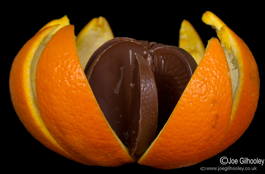 How a chocolate Orange is made - first you peel the orange almost open