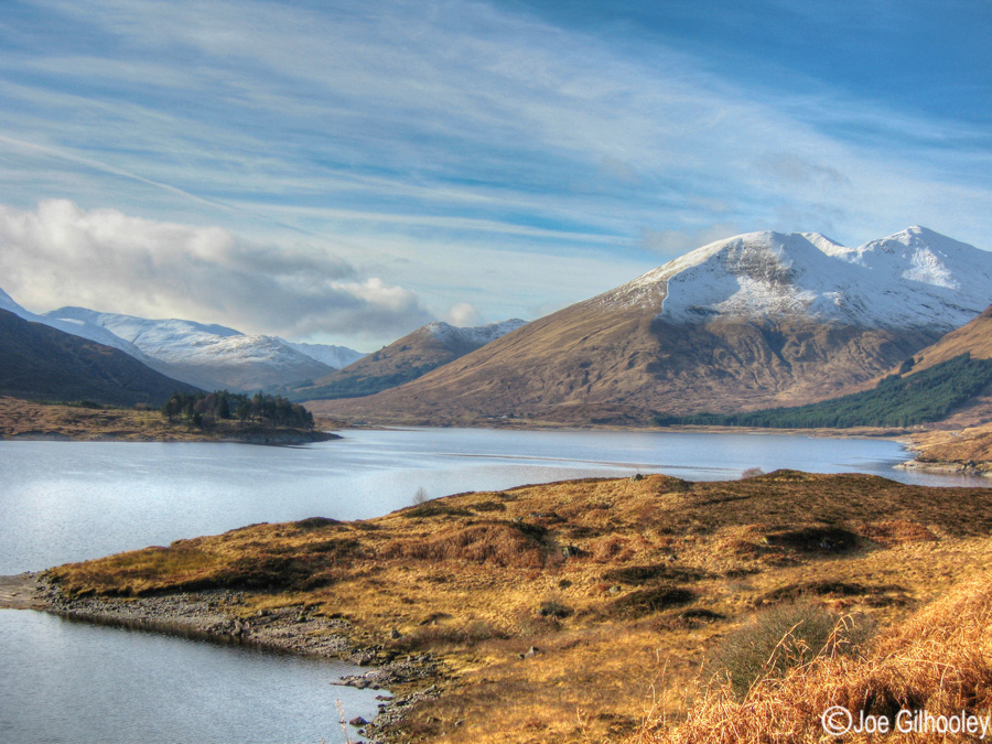 Loch Cluanie with mountain Aonach Meadhoin and Coire na Cadhe to right side. Into Glen Shiel.