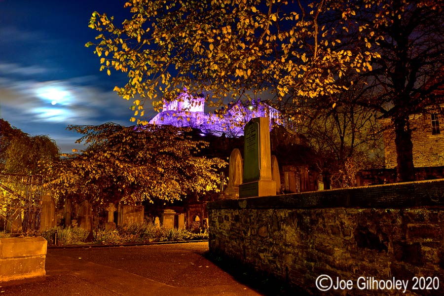 St Cuthbert's Graveyard Edinburgh by night - Edinburgh Castle