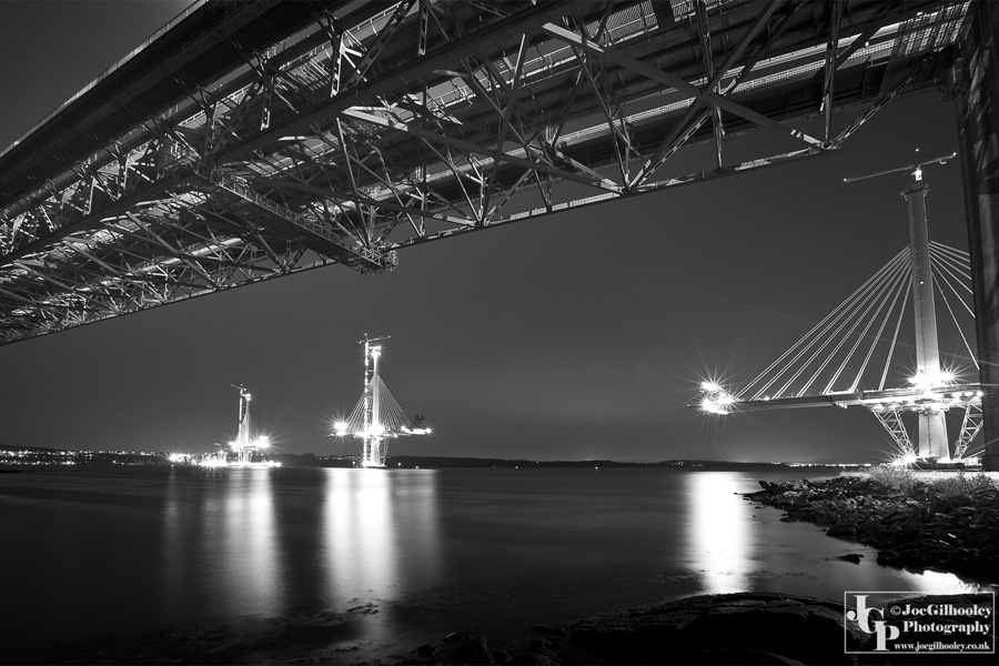 Forth Road Bridge with Queensferry Crossing in background