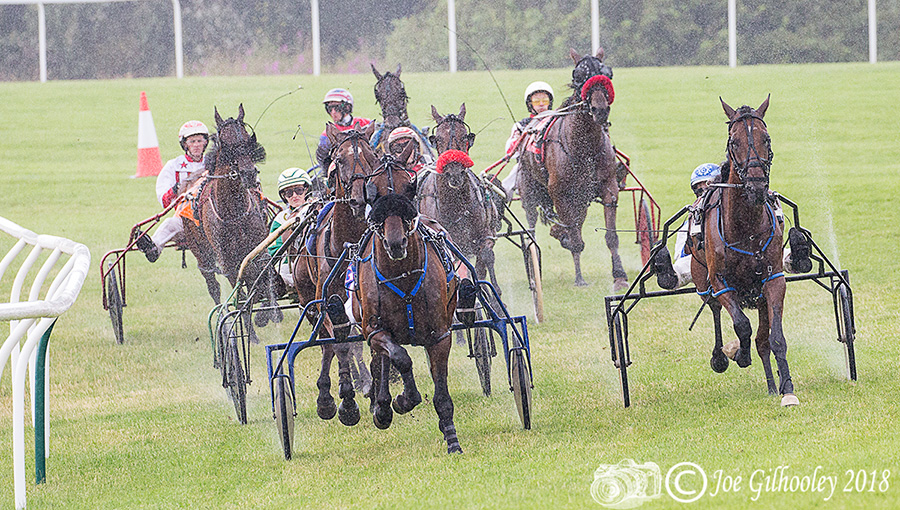 Harness Racing at Musselburgh Racecourse - Second race in the rain. Lots of spray from wheels