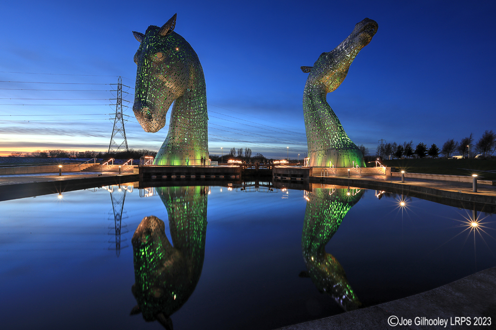 The Kelpies lit at night