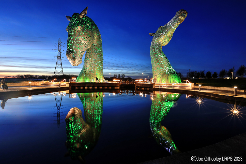 The Kelpies lit at night
