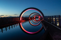 The Falkirk Wheel the top  lit during blue hour after sunset 7th March 2023