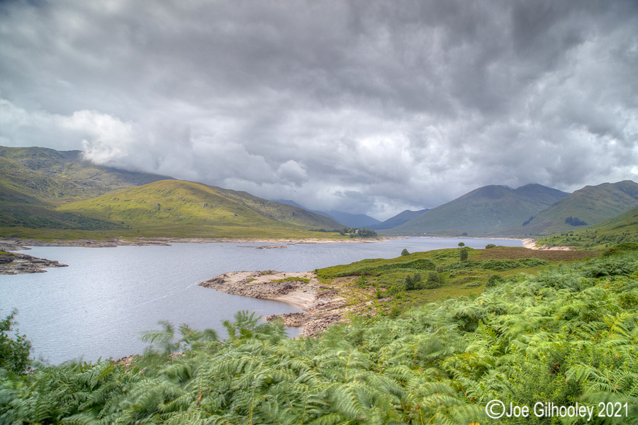 Loch Cluanie with mountain Aonach Meadhoin and Coire na Cadhe to right side