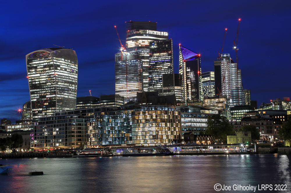 Office Blocks by River Thames after Sunset