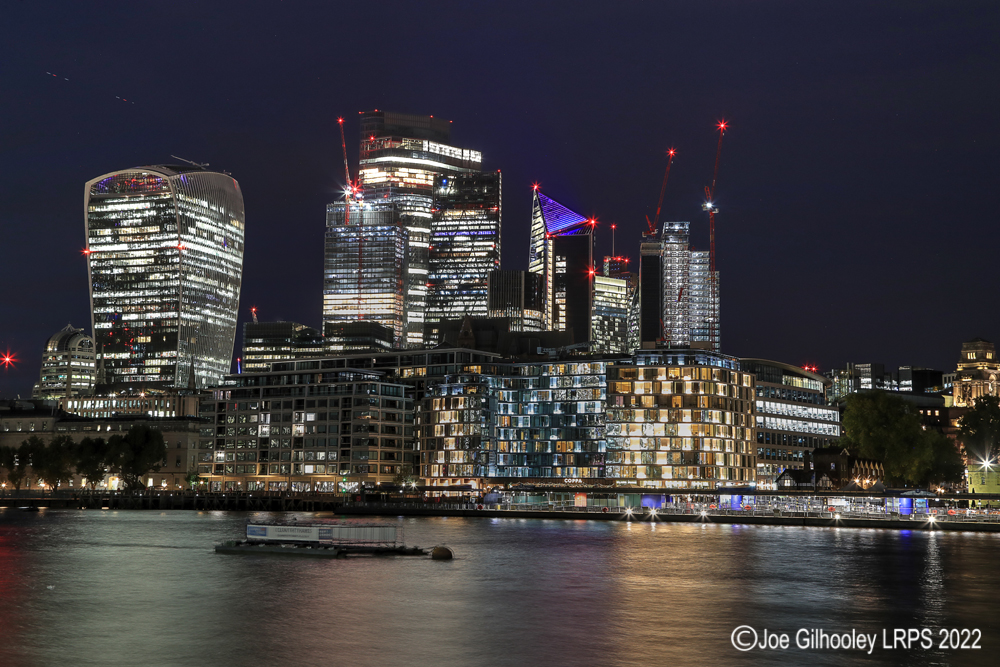 Office Blocks by River Thames after Sunset