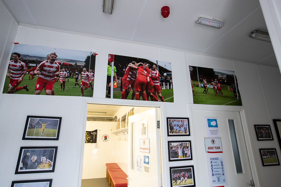 Posters in place in home dressing room