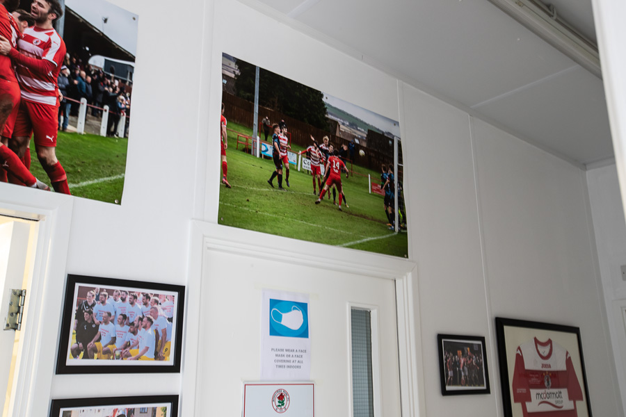 Posters in place in home dressing room