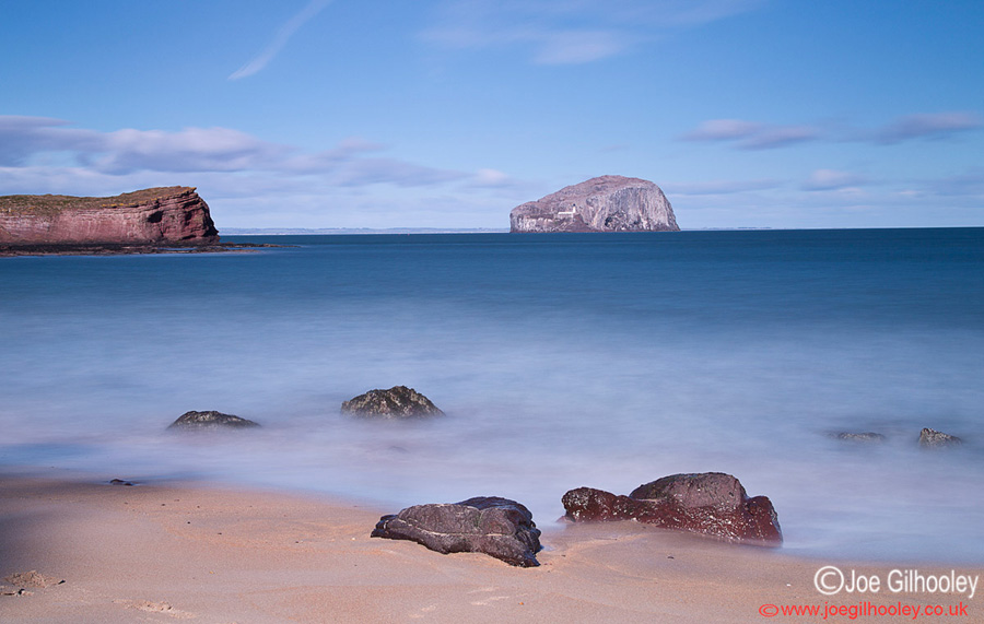 The Bass Rock and incoming tide on Seacliff Beach