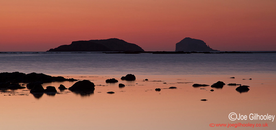 Sunrise at Yellowcraigs Beach. About an hour before dawn. The Bass Rock in distance