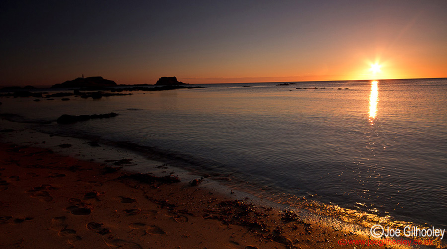 Sunrise at Yellowcraigs Beach. Changed to wider lens The Bass Rock and Fidra in this angle